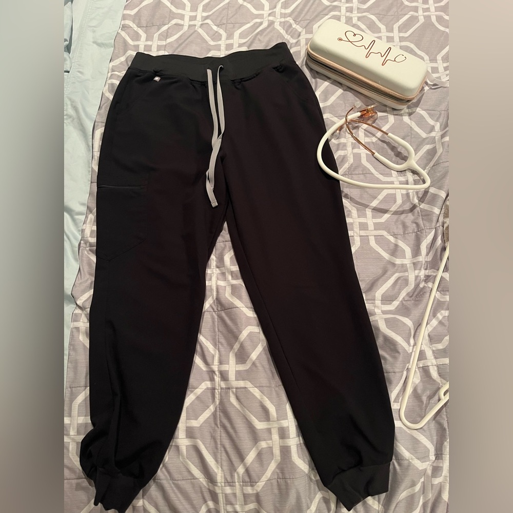 Figs scrub pants, no rips, no holes, no stains